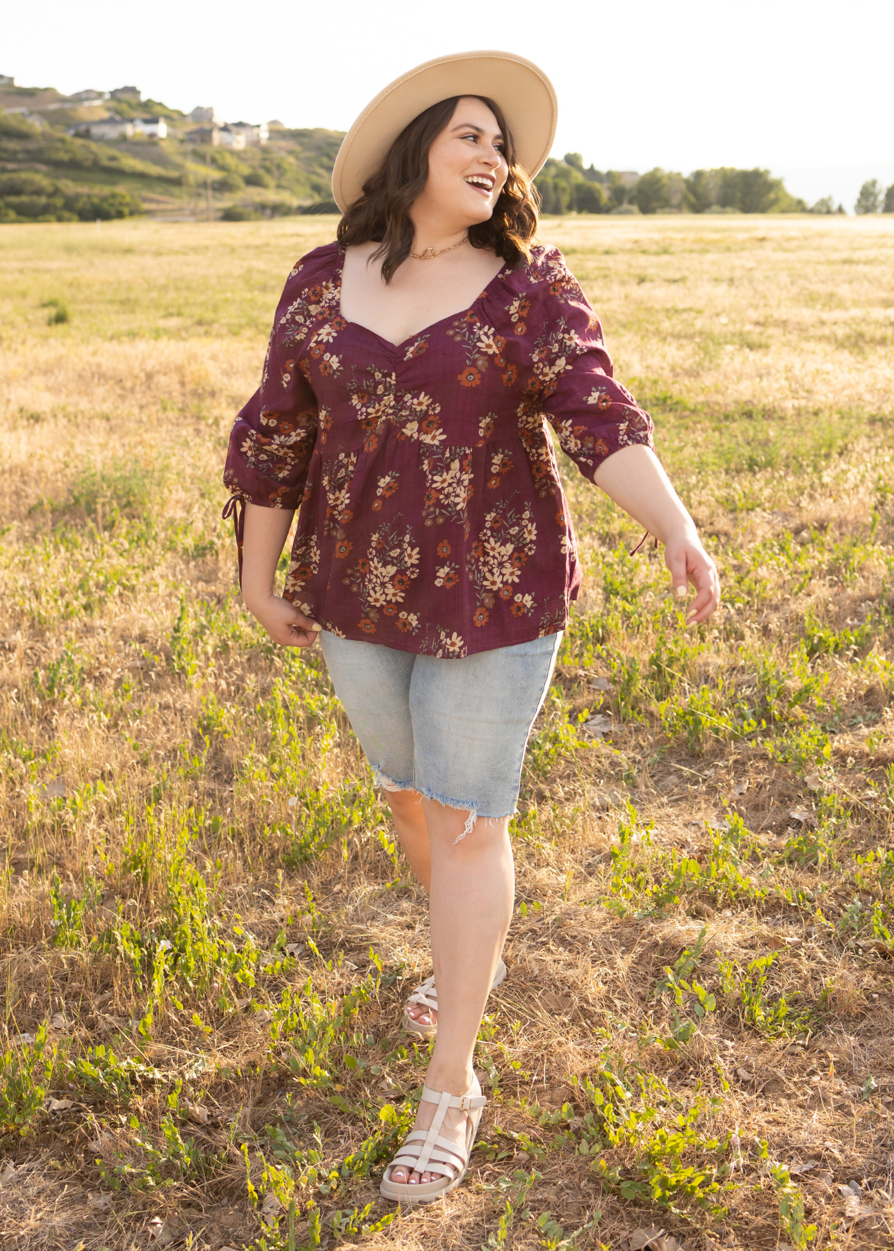 Plus size plum floral top with sweetheart neck