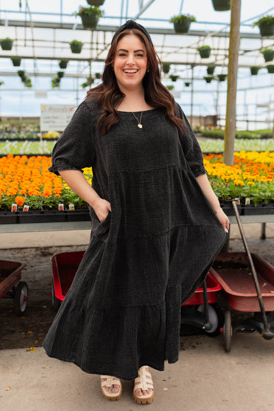 Plus size black washed tiered dress with square neck and pockets