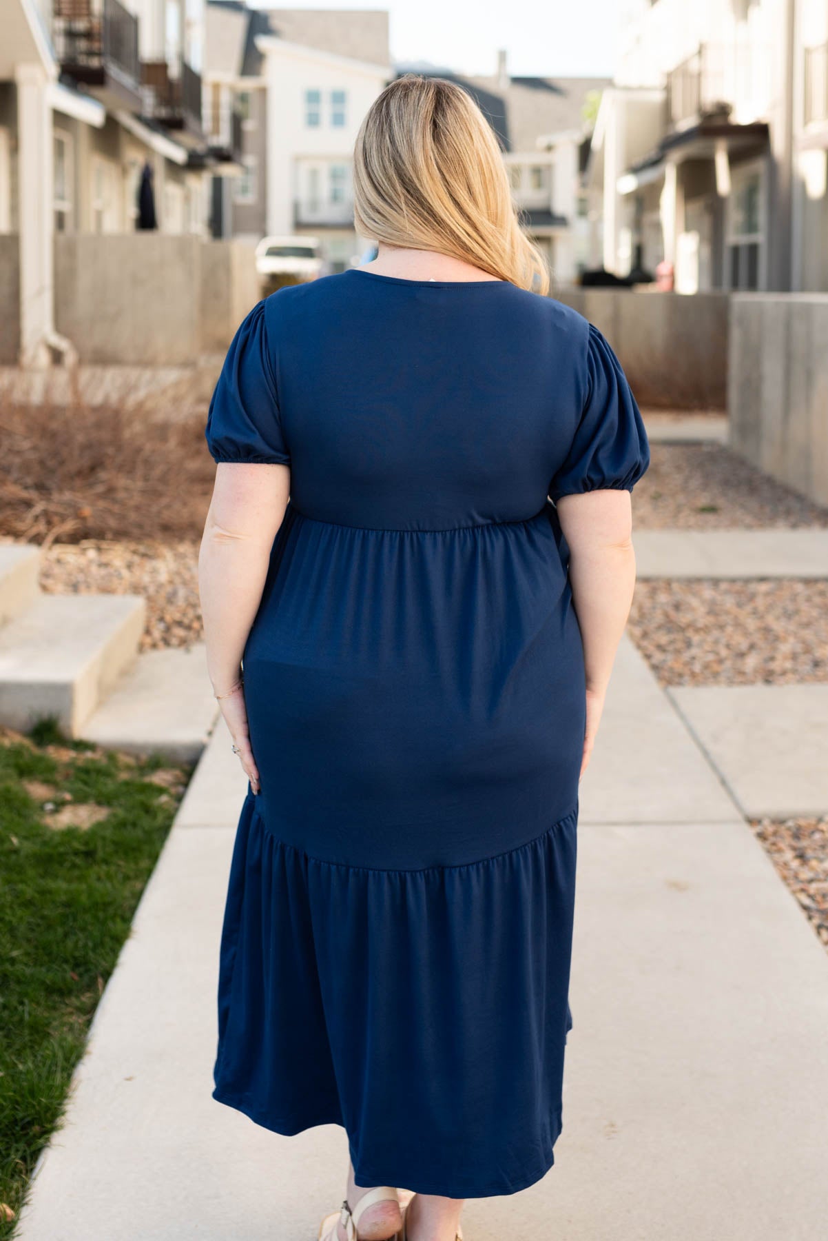Back view of the plus size navy tiered dress