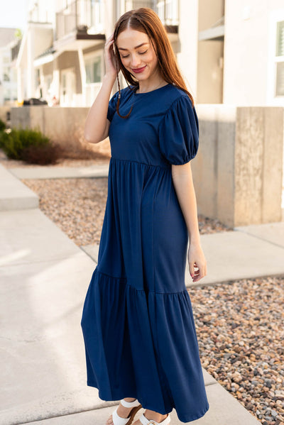 Side view of the navy tiered dress