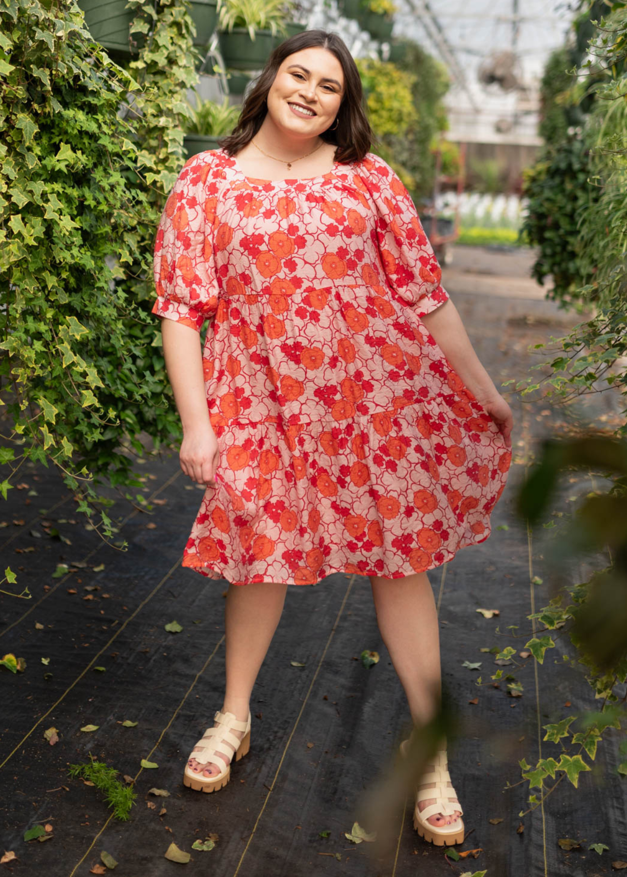 Plus size pink floral dress with tiered skirt