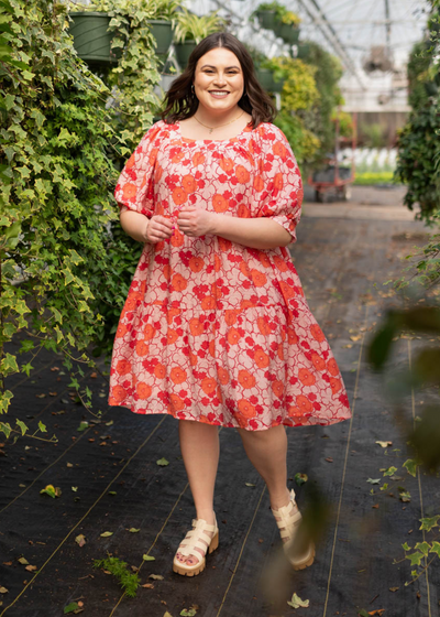 Plus size pink floral dress with short sleeves