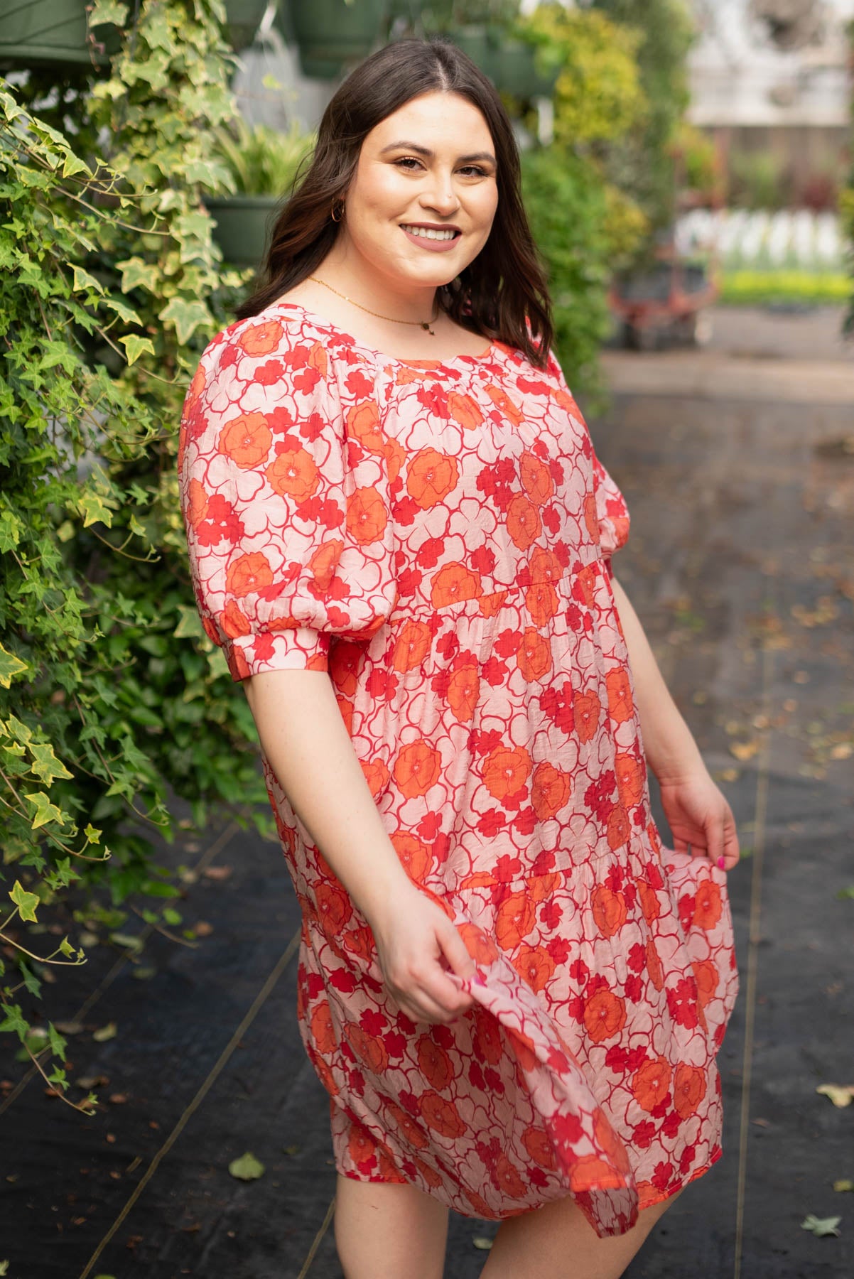 Side view of the plus size pink floral dress