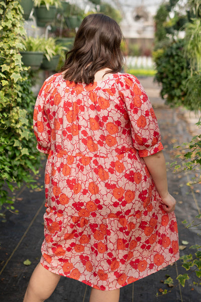 Back view of the plus size pink floral dress