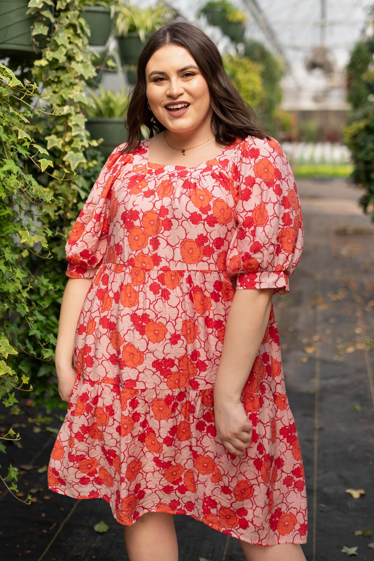 Plus size pink floral dress with ruffle on the cuff