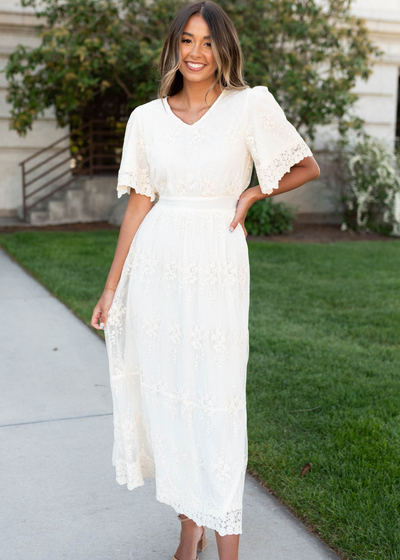 Cream lace embroidered dress with a v-neck