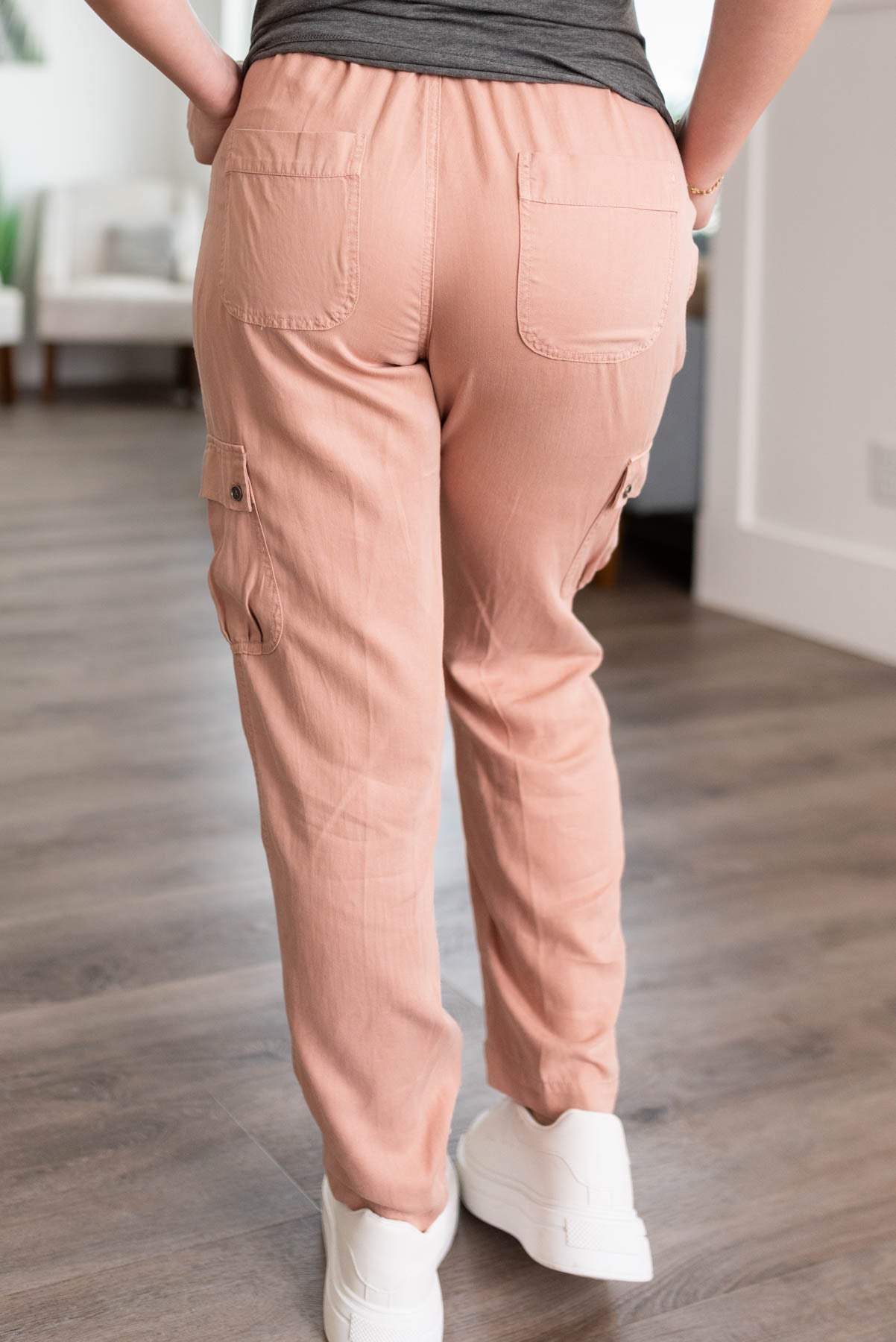 Back view of the dusty peach cargo joggers