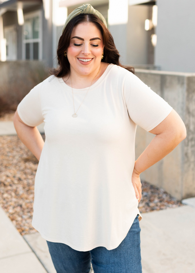 Front view of the plus size taupe top