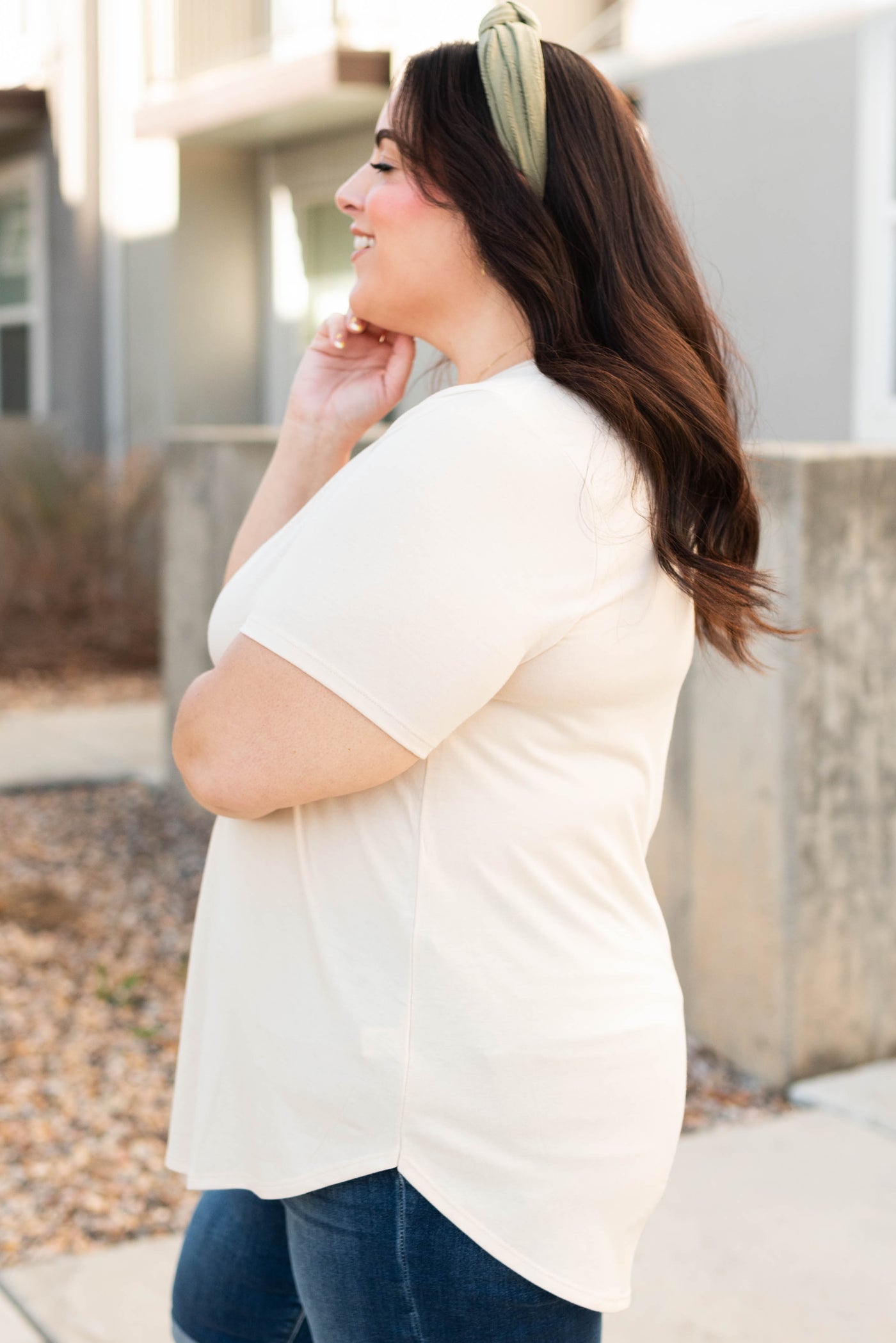 Side view of the plus size taupe top