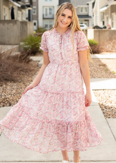 Pink Floral tiered dress with ruffles on the sleeve and neck