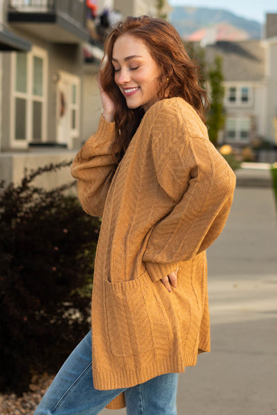 Side view of the mustard cardigan