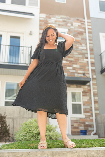 Short sleeve black dress with square neck