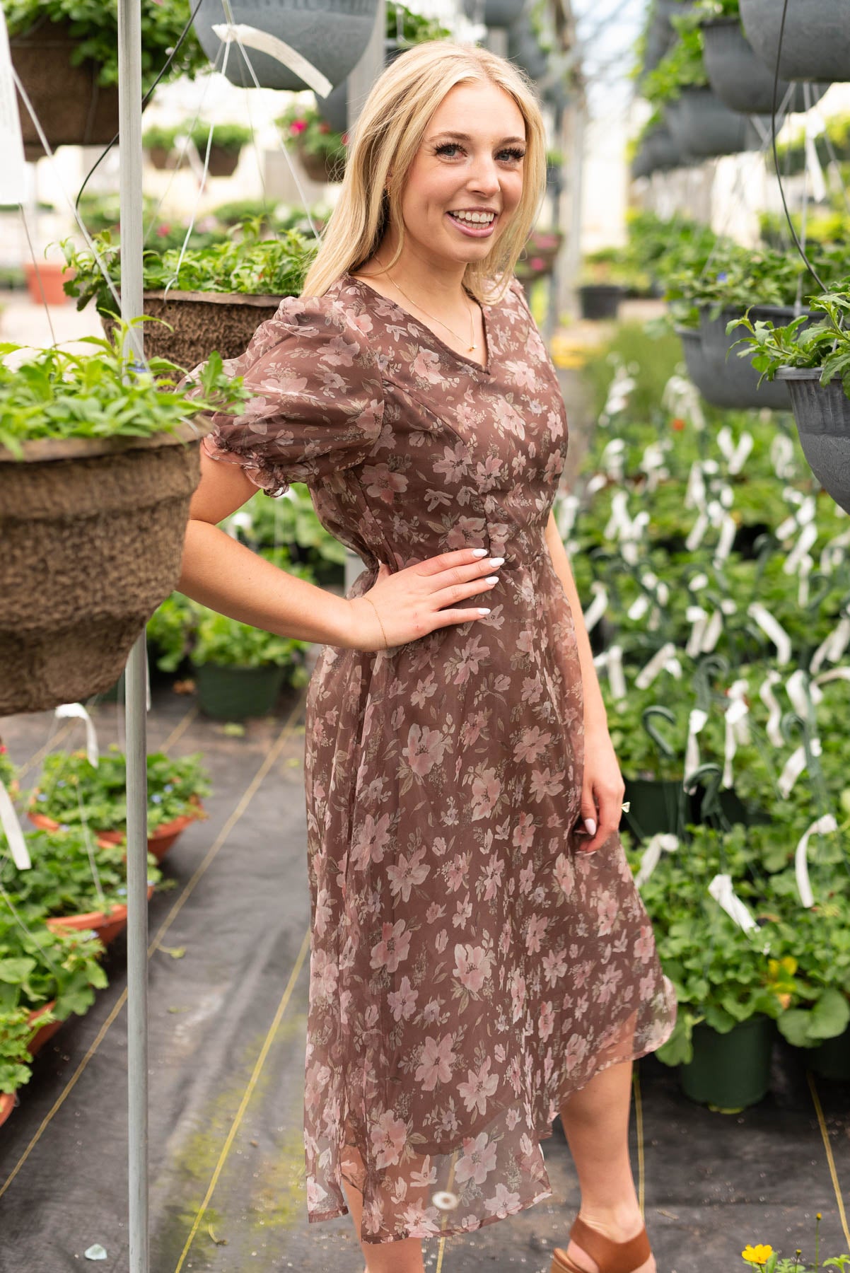 Side view of the brown floral organza dress