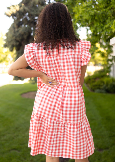 Back view of a red gingham dress