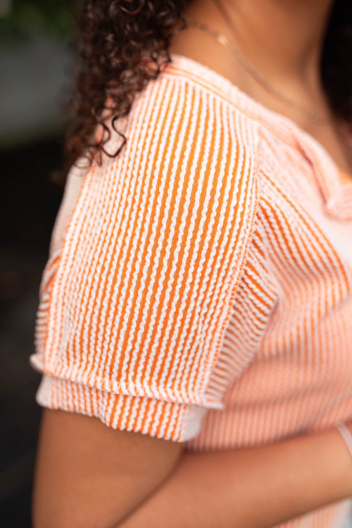 Close up of the sleeve on the sunkist ribbed top