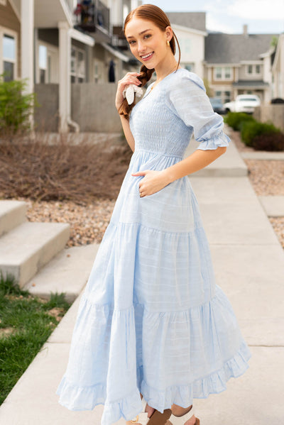 Side view of the sky blue maxi dress with pockets