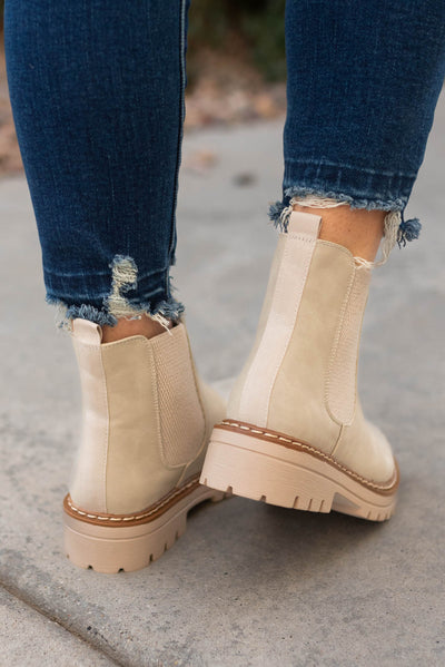 Back view of sand Chelsea boots
