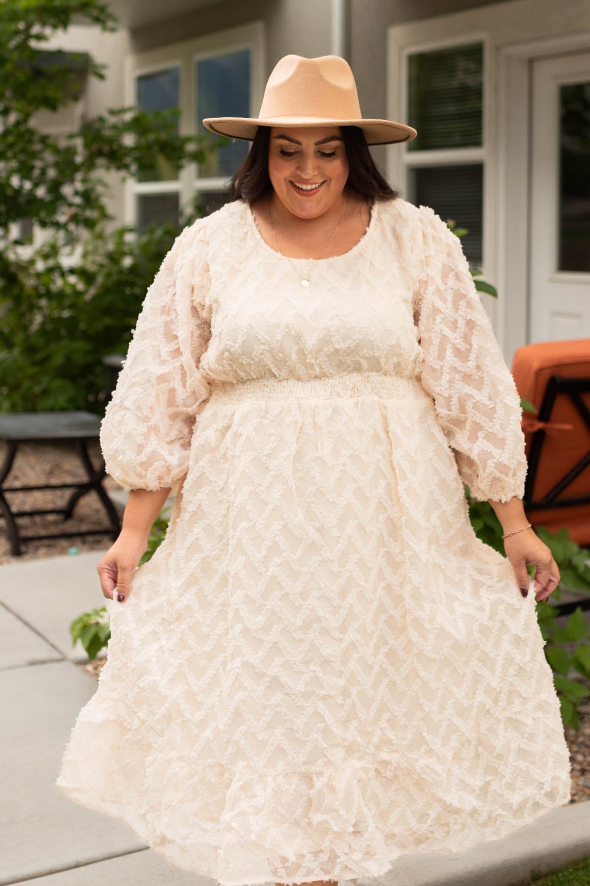 Plus size cream textured dress with a high waist