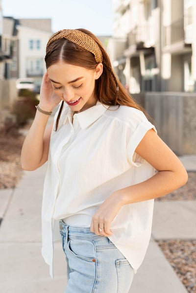 Side view of the off white blouse