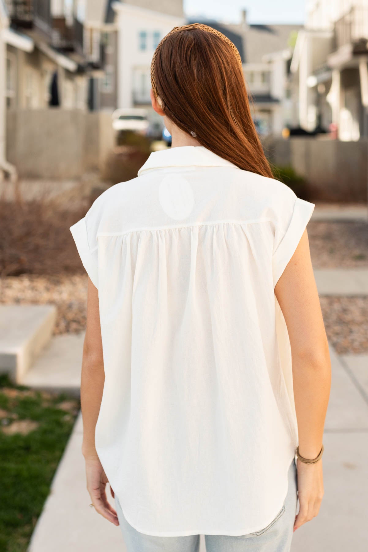Back view of the the off white blouse