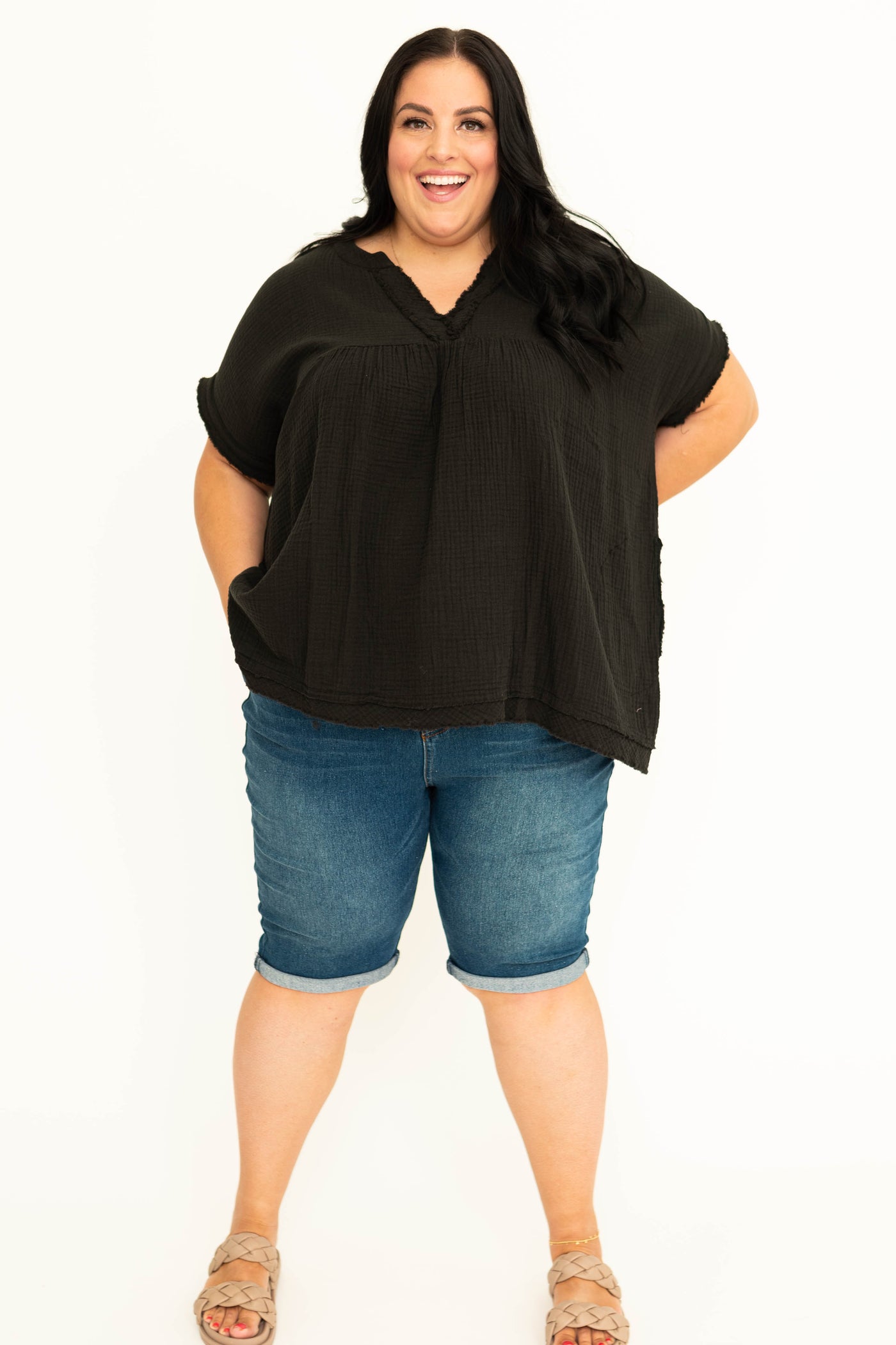 Plus size gauze top with a v-neck and pockets