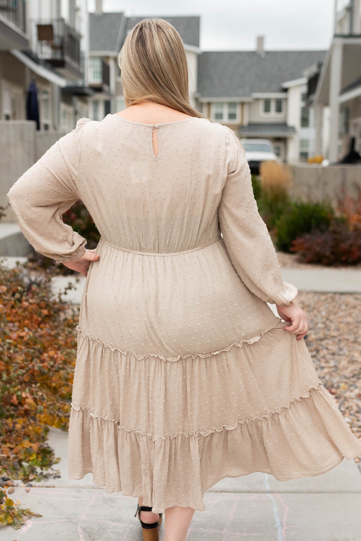 Back view of a plus size stone textured dress