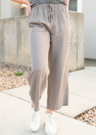 Grey drawstring wide leg pants with pockets
