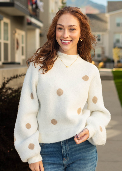 Ivory sweater with a mock turtle neck
