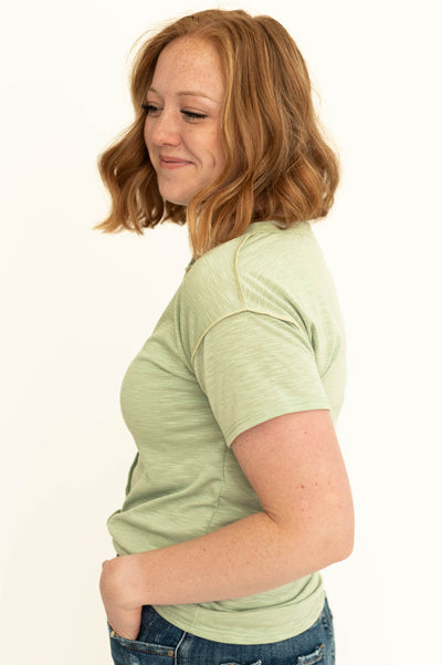 Side view of sage green top