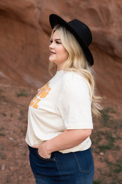 Side view of a plus size thankful ivory tee