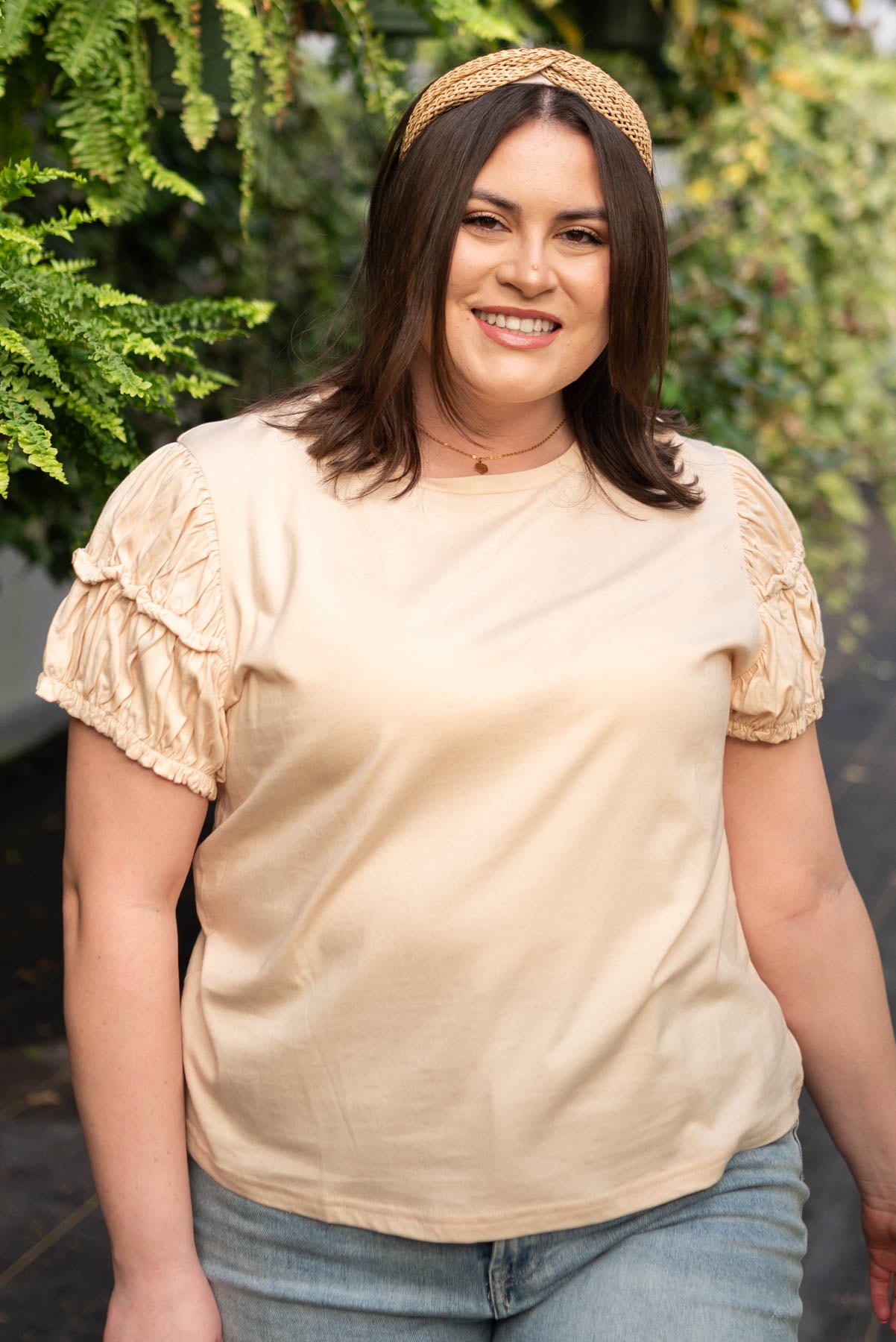 Front view of the plus size cream puff sleeve top