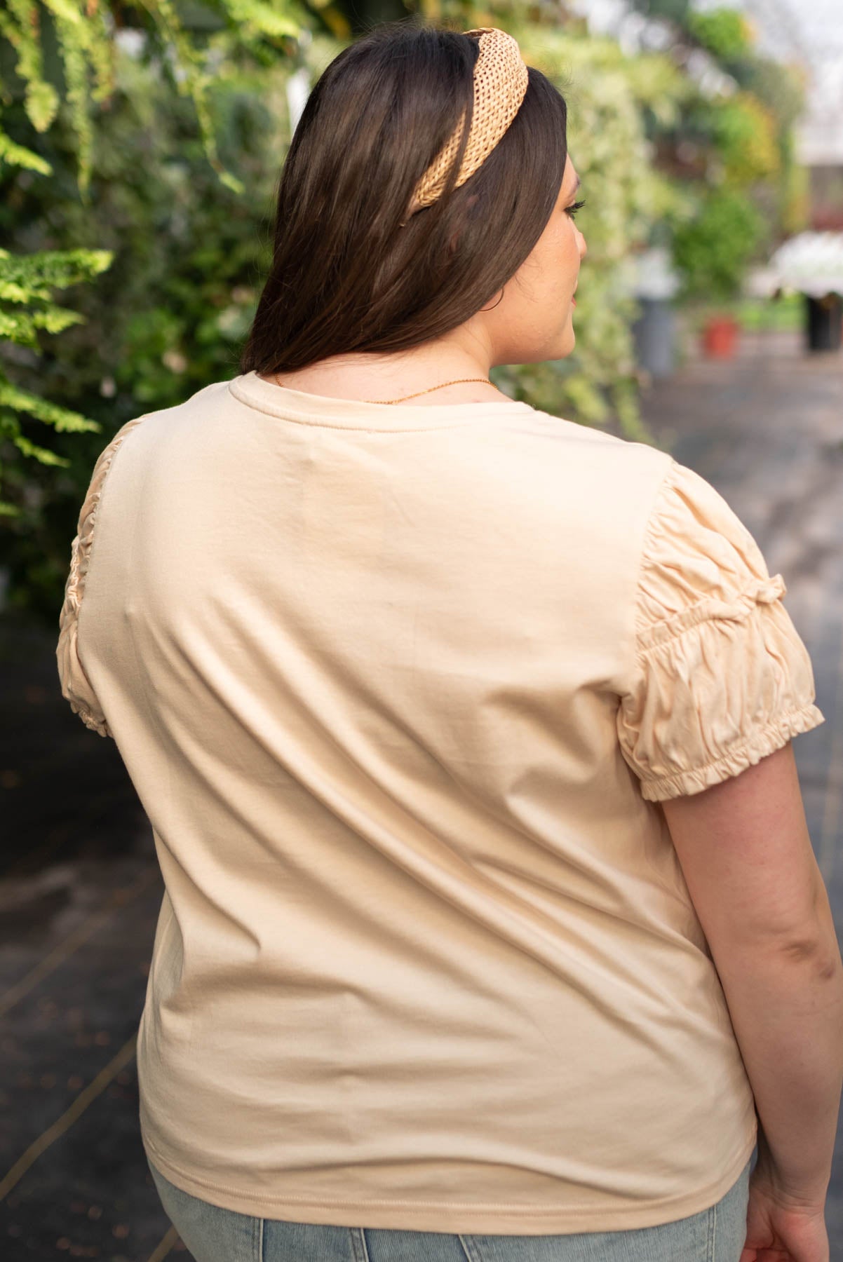 Back view of the plus size cream puff sleeve top