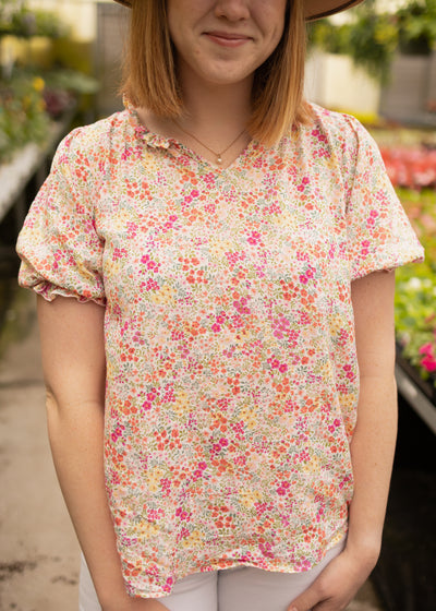 Medium pink floral top with short sleeves