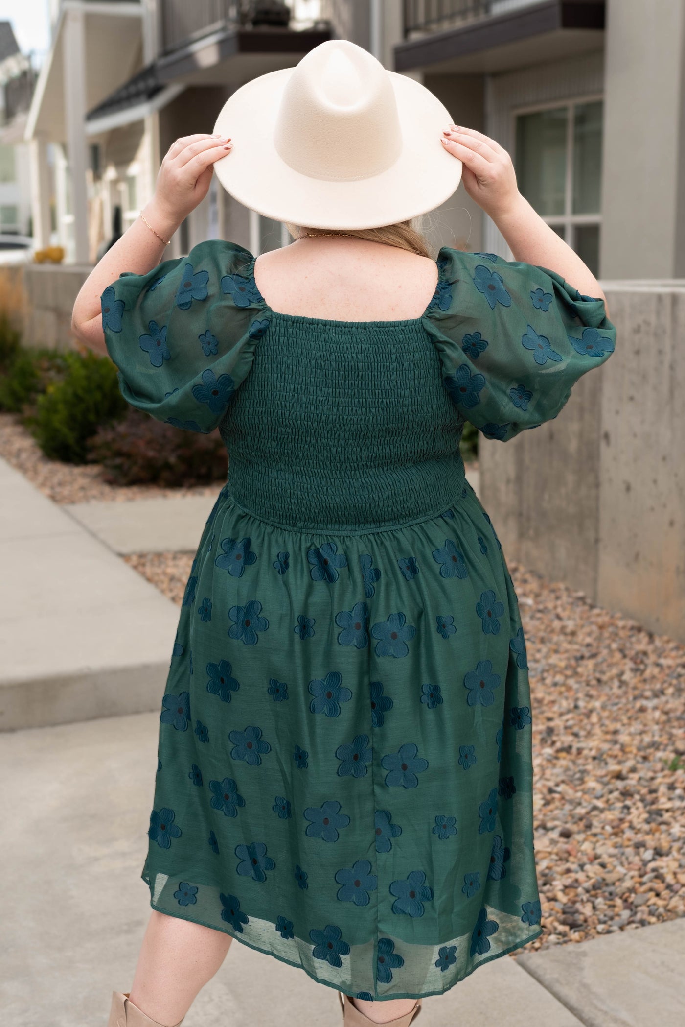 Back view of the plus size hunter green floral dress