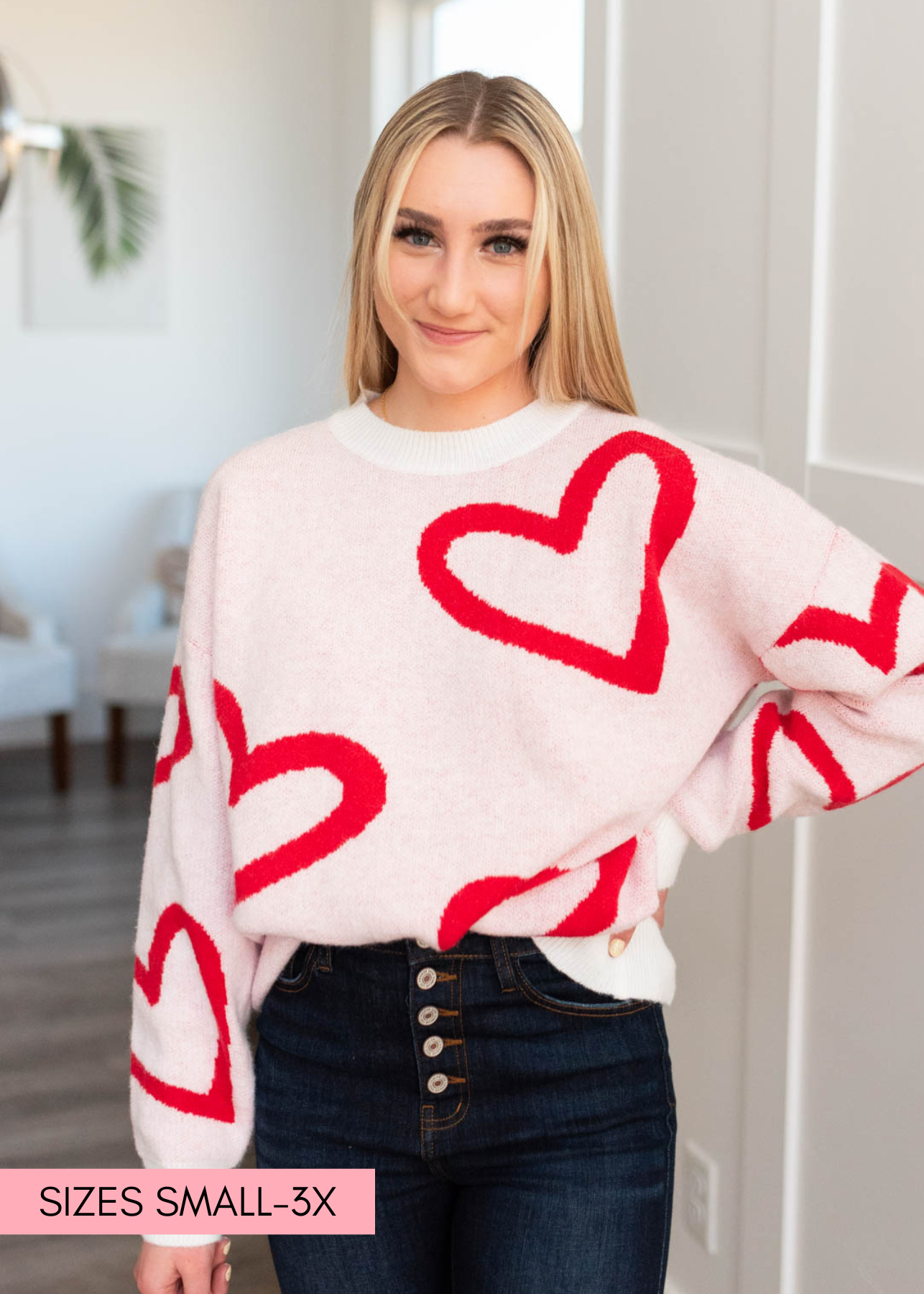 http://www.mysisterscloset-boutique.com/cdn/shop/files/JaylieRedHeartSweater1.png?v=1704335451