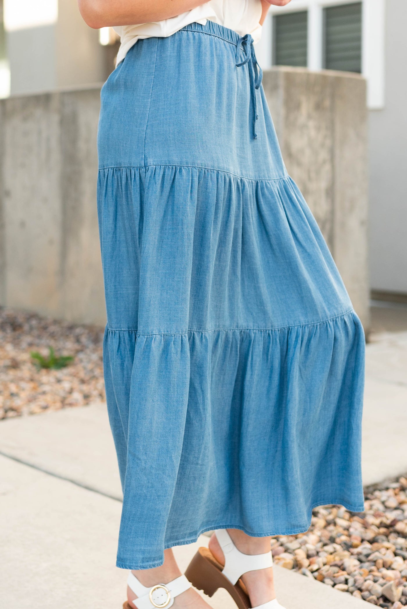 Side view of the medium wash skirt
