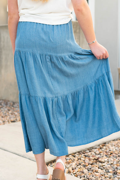 Back view of the medium wash skirt