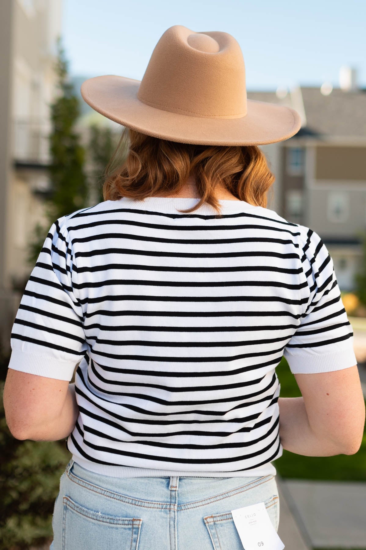 Back view of the ivory striped top