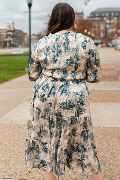 Back view of the plus size beige floral dress