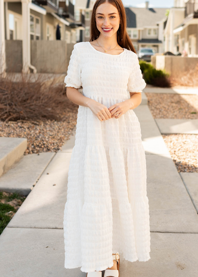 White textured maxi dress with short sleeve and tiered skirt