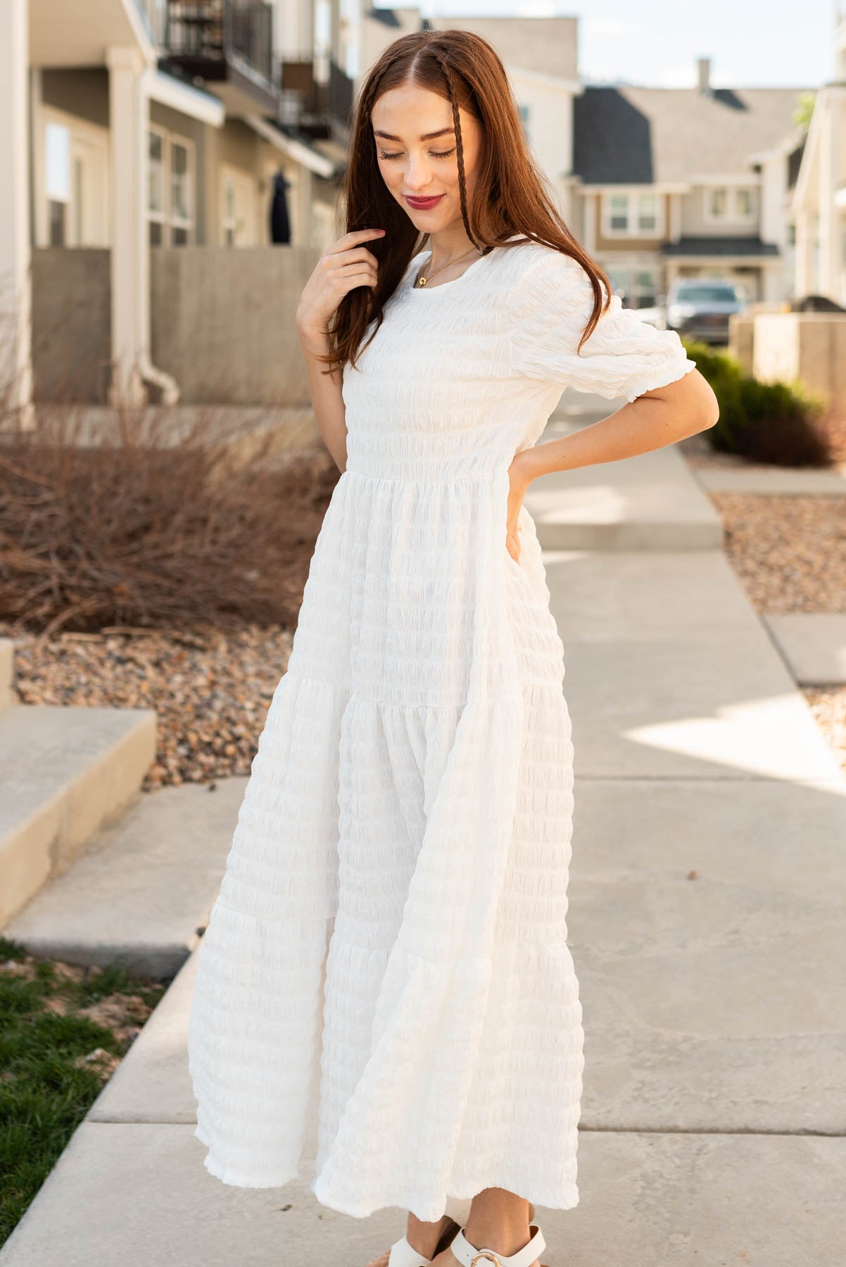 Side view of the white textured maxi dress