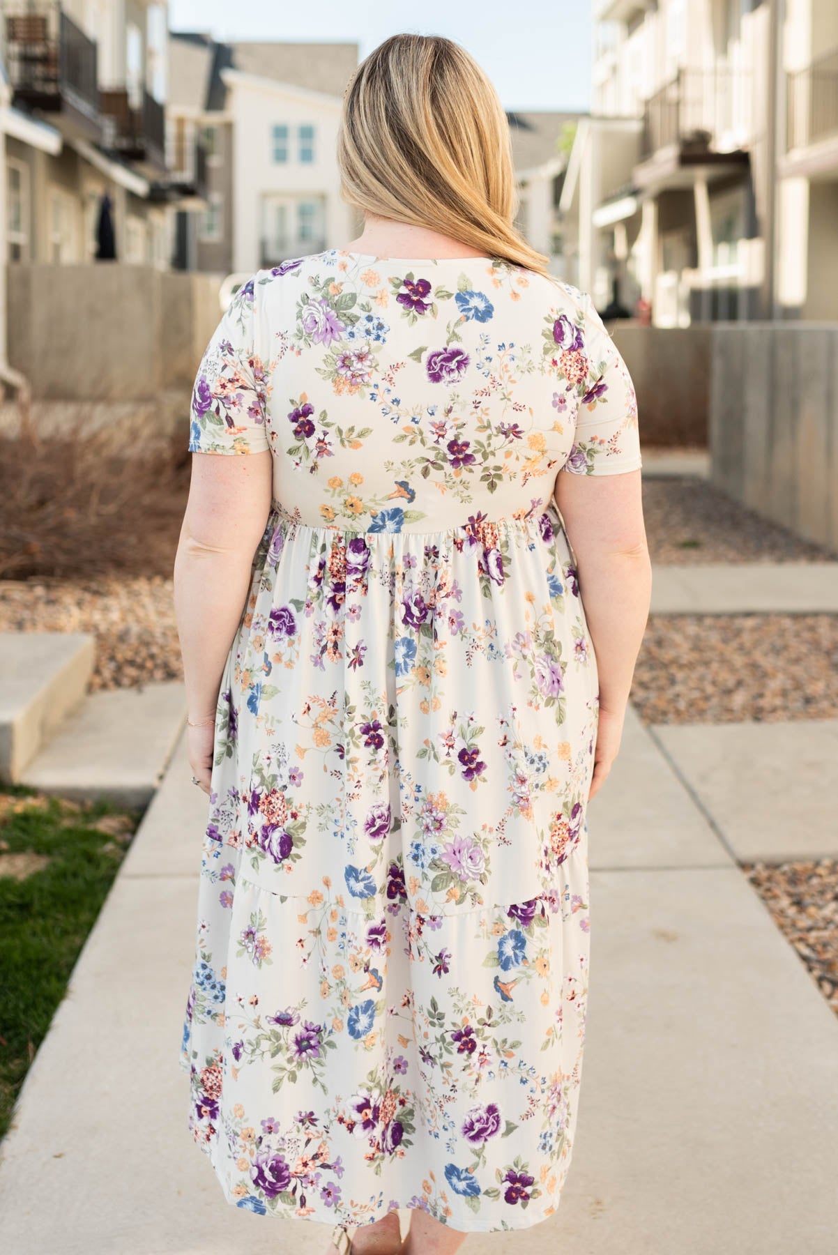 Back view of the plus size grey floral dress