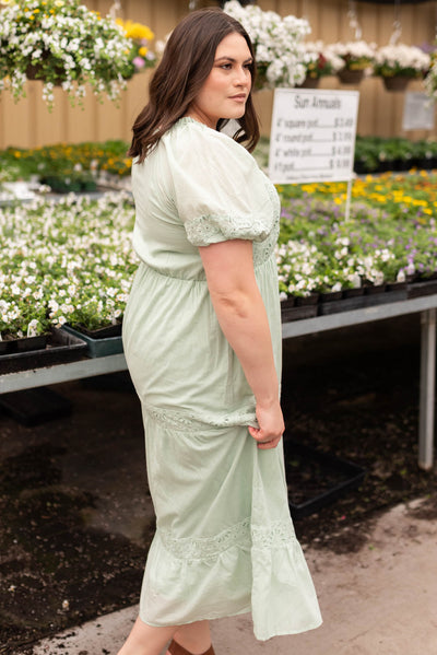 Side view of the plus size sage eyelet tiered dress
