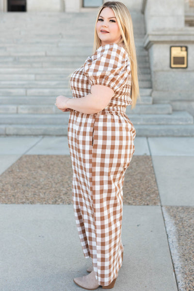 Side view of the taupe gingham jumpsuit