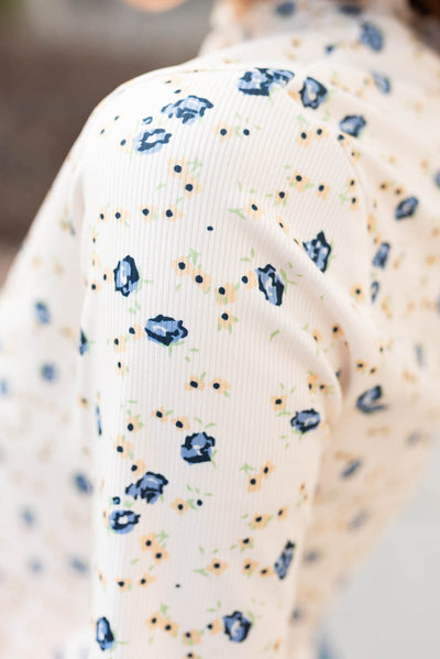 Cream floral top with blue and yellow flowers