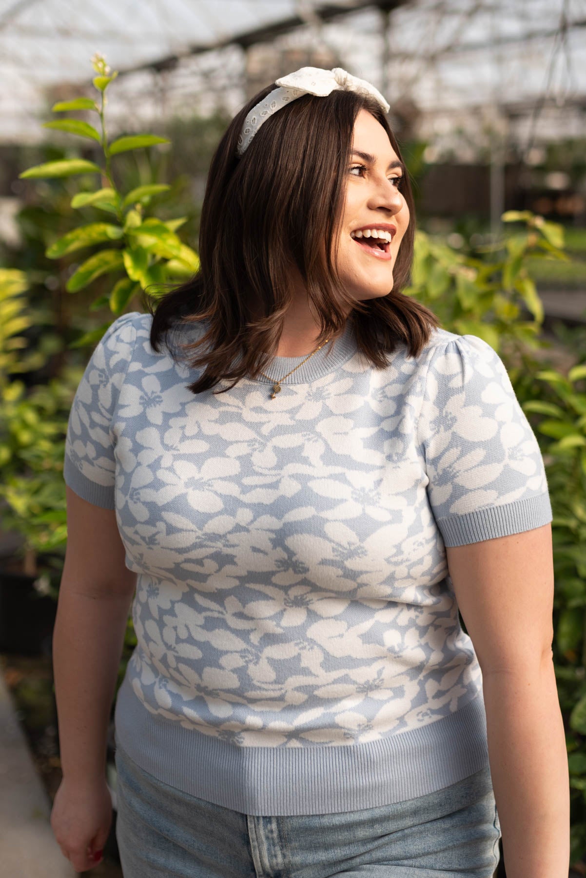 Plus size blue floral knit top with short sleeves