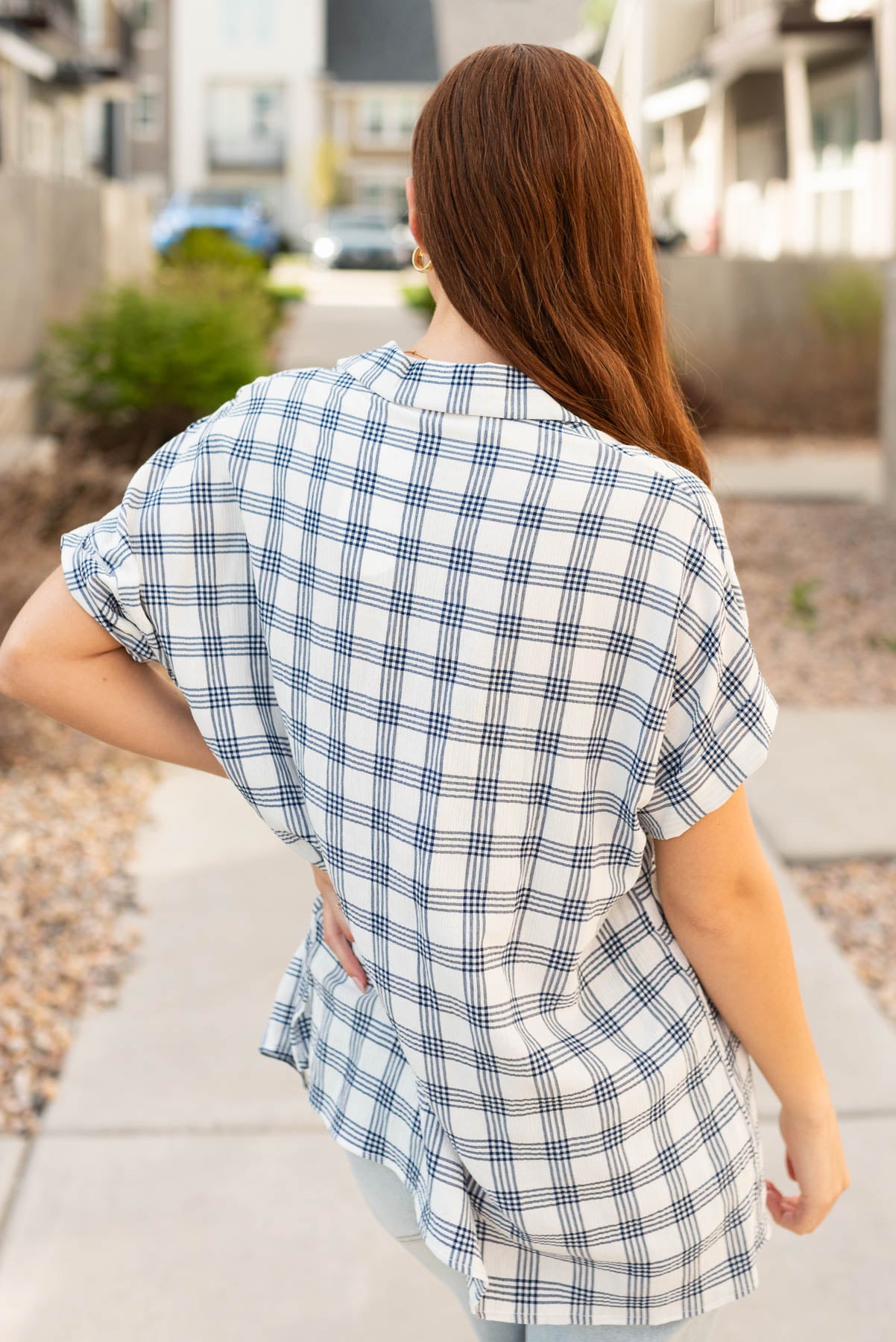 Back view of the navy button down top