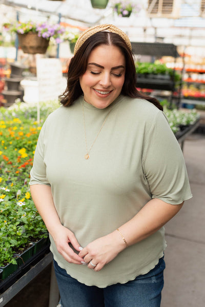 Plus size sage textured knit top with slight mock turtle neck