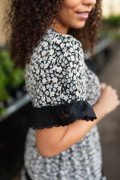 Close up of the sleeve on the black floral dress