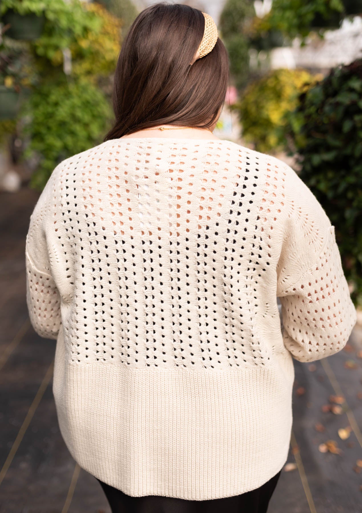 Back view of the plus size ivory knitted cardigan